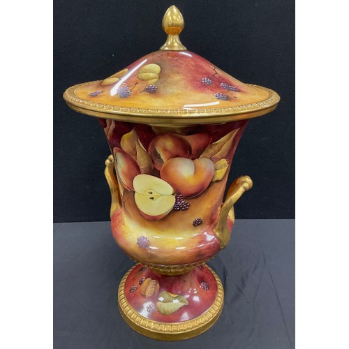 222 - A large Caverswall hand painted urn and cover, M Bates, painted with Apples, Pears and Blackberries,... 