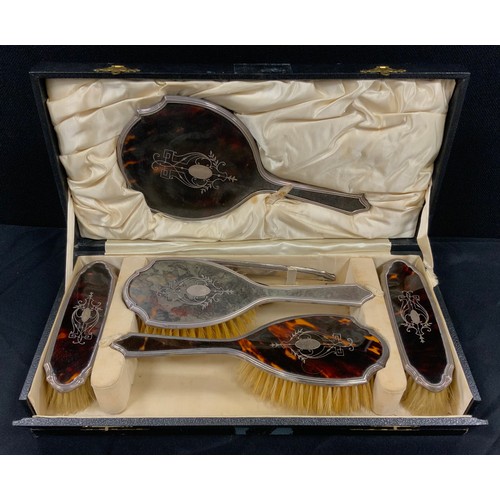 267 - Silver and faux tortoise shell dressing table set including; brushes, combs, mirror; etc, cased, Lon... 