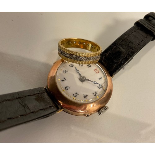 274 - A 9ct gold cased wristwatch, manual wind movement, leather strap, 17.9g gross;  a yellow metal etern... 