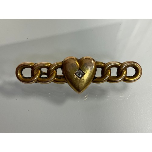 282 - A 15ct gold diamond heart and rope link bar brooch, stamped 15ct, 3g gross