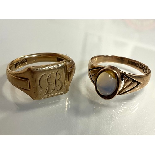 292 - A 9ct gold signet ring, initialled top, size P, another cabochon moonston, 9ct gold shank, size Q, 9... 