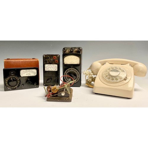 629 - A cream GPO telephone; three gauges; a shock machine