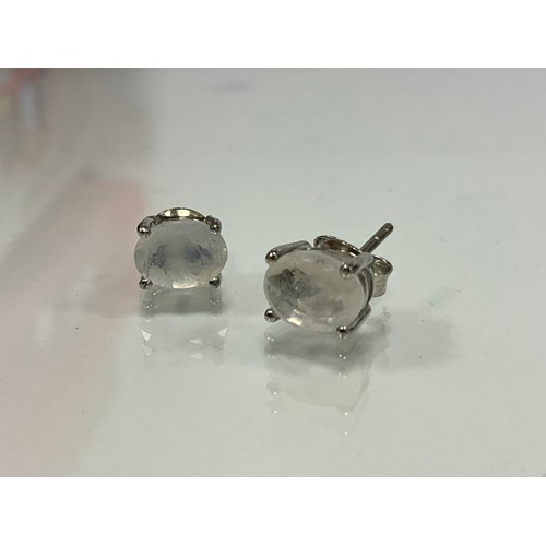 298 - A Pair of moonstone stud earrings, in silver mounts