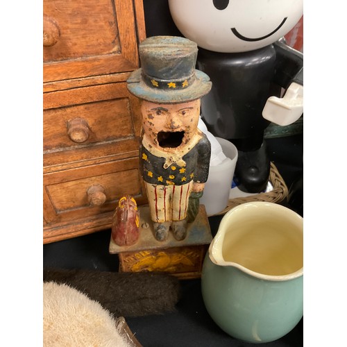 235 - Boxes and objects - a cast iron novelty money box of ‘Uncle Sam’;  19th century porous copper water ... 