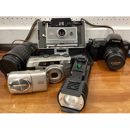 210 - Cameras and camera equipment - Polaroid Automatic 240 Land Camera;  Sunpak CV-300 compact video ligh... 