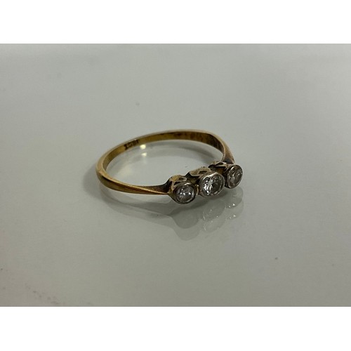 311 - A diamond three stone ring, central irregular old cut stone flanked by old brilliant cut diamonds, t... 