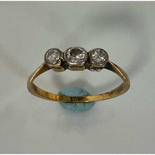 311 - A diamond three stone ring, central irregular old cut stone flanked by old brilliant cut diamonds, t... 