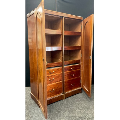 142A - A Victorian mahogany double compactum wardrobe, 187cm high x 117cm wide x 56cm deep.