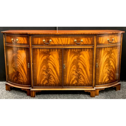 184A - A George III revival bow-fronted break-centre side cabinet, by Bevan Funnell Reprodux furniture, mah... 