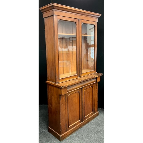 236 - A Victorian mahogany bookcase cabinet, 199cm high x 104cm wide x 40cm deep.