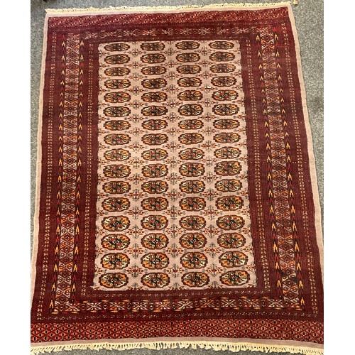 234 - A Bokhara silk and wool mix rug, hand-knotted in tones of red, grey, black, and orange, 173cm x 130c... 