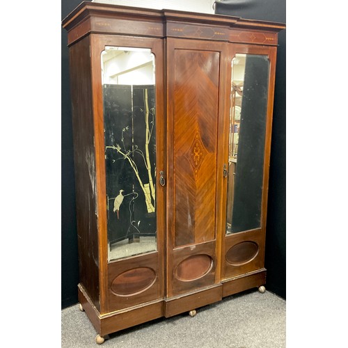 240 - A Victorian mahogany compactum wardrobe, break-centre front, with inlaid centre panel, flanked by pa... 