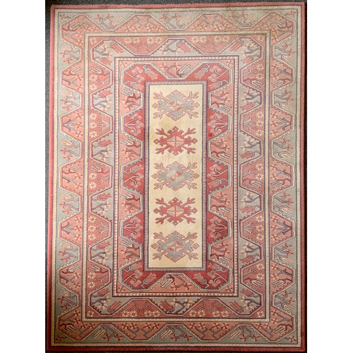 150A - A middle eastern style woollen rug, loomed in soft tones of pink, blue, and cream, 232cm x 170cm.