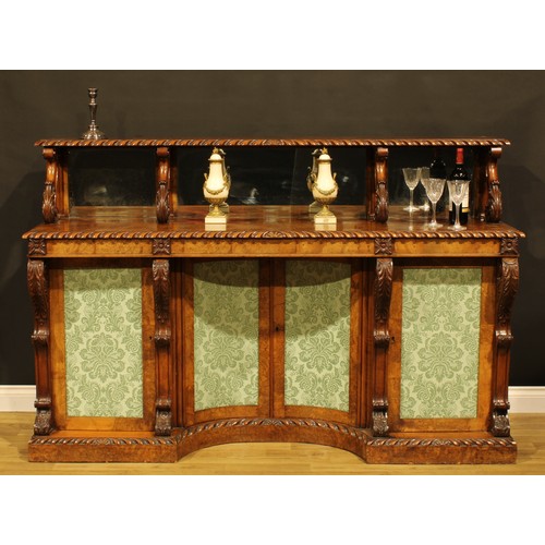 1445A - A Victorian walnut library side cabinet, the superstructure with three mirror plates above a rectang... 