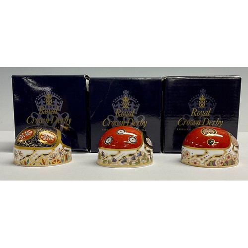 10 - A Royal Crown Derby Paperweight, Red Ladybird, with two spots, another with seven spots; and a Blue ... 