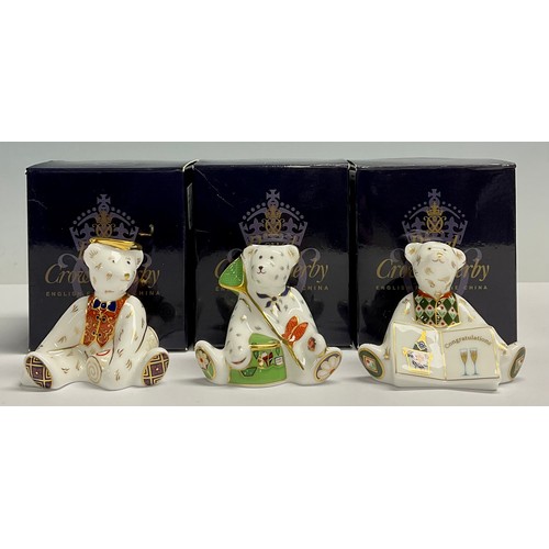 13 - A Royal Crown Derby miniature shopper bear, Graduate, 7cm high; two others, Gone Fishing, 6cm high a... 