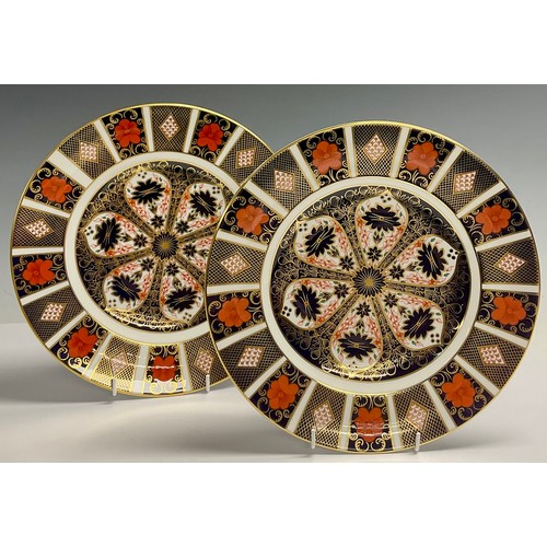 17 - A pair of Royal Crown Derby Imari 1128 pattern dinner plates, 27cm diameter, printed marks, one firs... 