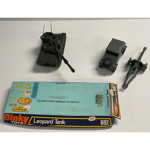 132 - Toys & Juvenalia - a Dinky Toys die-cast metal Leopard Tank 692, original packaging, 10cm high overa... 