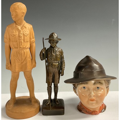 139 - An early 20th century dark patinated bronze, of a Boy Scout, 19.5cm high; a terracotta model, of a B... 