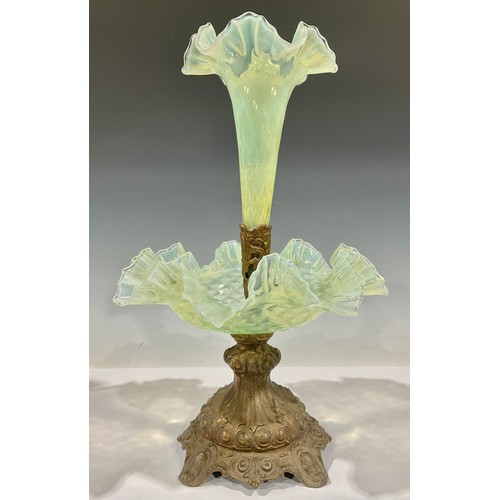 88 - A 19th century shaped circular table centre, central uranium vaseline glass epergne flute, conformin... 