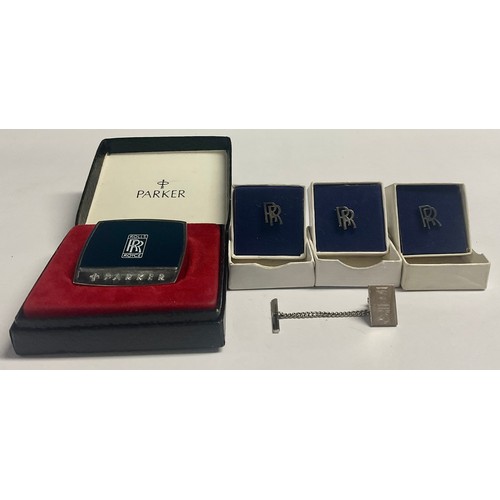 205 - Rolls Royce - a Rolls Royce silver long service pin, 25 years, London 1990; three Rolls Royce lapel ... 