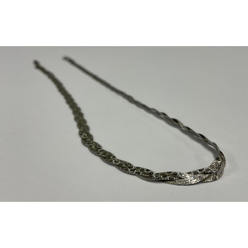 191 - A 9ct white gold necklace, plat double interlinked chain