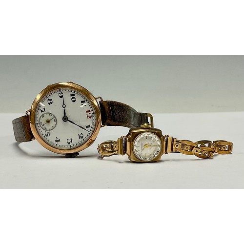 192 - A 9ct gold wristwatch, white enamel dial, subsidiary seconds dial at 6 o'clock, side wind; a lady's ... 