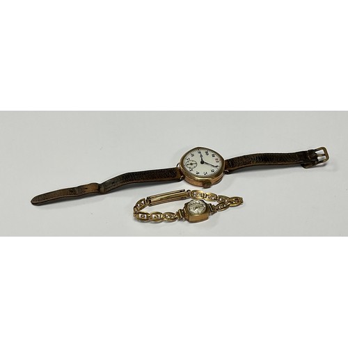 192 - A 9ct gold wristwatch, white enamel dial, subsidiary seconds dial at 6 o'clock, side wind; a lady's ... 