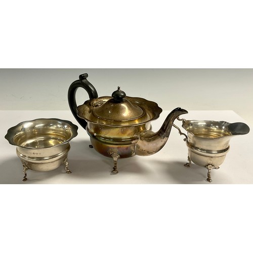 A V silver three piece tea service, comprising teapot, milk jug and sugar bowl, Birmingham 19