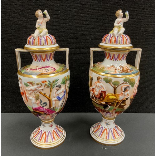 6 - A pair of 20th century Capodimonte moulded porcelain vases with covers. Each decorated with a moulde... 