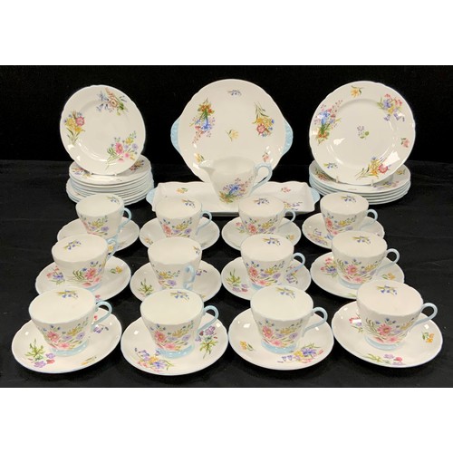 64 - A Shelley ‘Wildflower’ pattern 13668 tea service for twelve comprised of; a picnic plate, rectangula... 