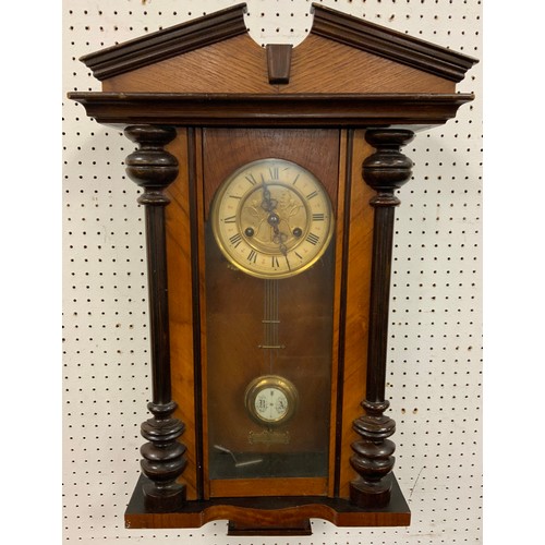 78 - A late 19th century walnut and ebonised Vienna wall clock, eight day movement, 72cm high