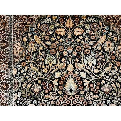 95 - A Kashmiri Tree of Life silk rug / carpet, 124cm x 77.5cm.