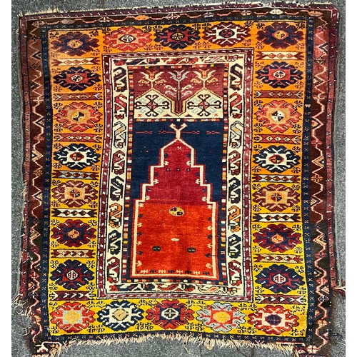 99 - A Turkish Ushak type hand-knotted woollen rug / carpet, 181cm x 93cm;  and a Lori-Bakhtiari type woo... 