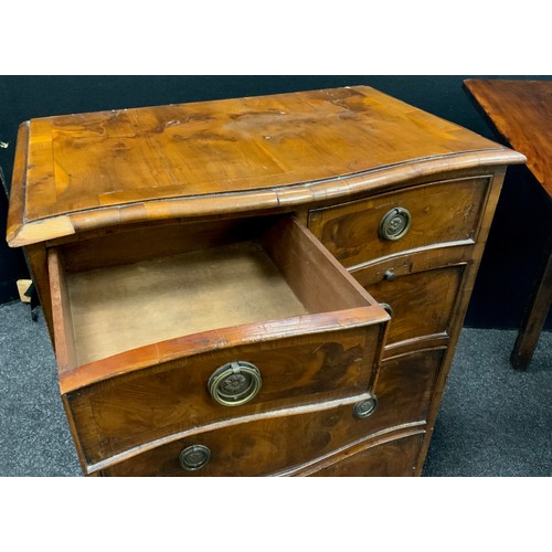 124 - A George III revival yew wood serpentine fronted small chest of drawers / side cabinet, 76.5cm high ... 