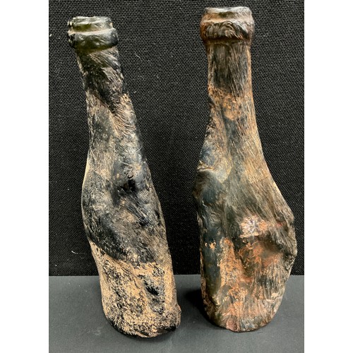 176 - Historical salvage including; two glass bottles possibly hit by a WWII air strike (2)