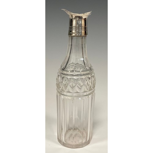 188 - A George IV silver five bottle cruet stand, boat shaped stand, central carrying handle, with five cu... 