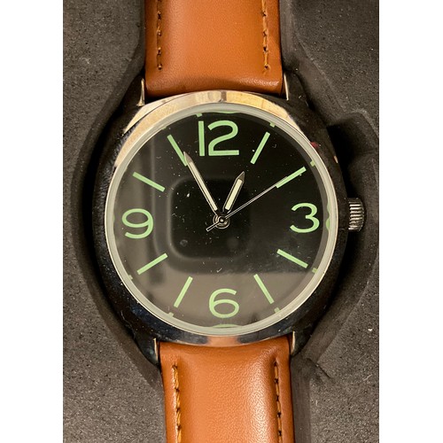 202 - Eaglemoss - a collection of twelve replica Military issue wristwatches, including British, American,... 