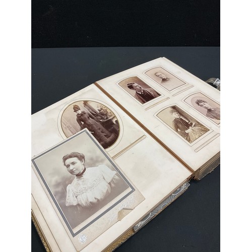 166 - A Victorian / Edwardian family photograph album, c.1890-1910.