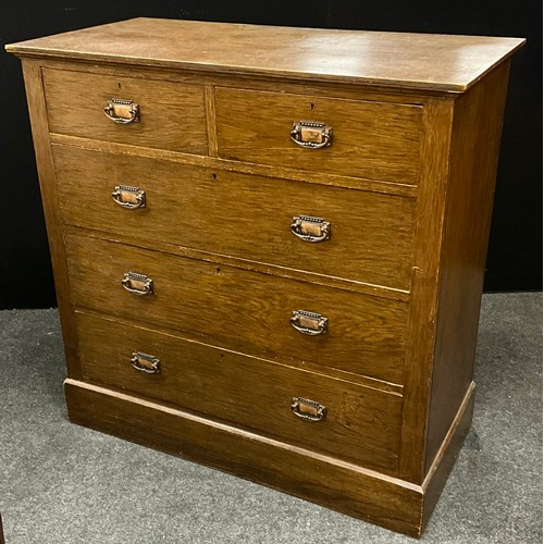 111 - An Edwardian oak chest, two short over three long drawers, Arts & Crafts copper handles, 104cm high,... 