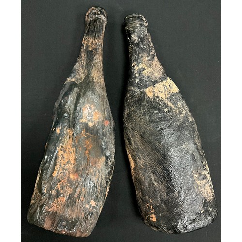 176 - Historical salvage including; two glass bottles possibly hit by a WWII air strike (2)