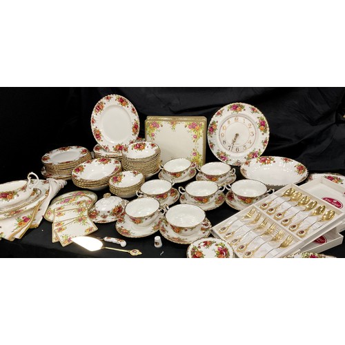 67 - Royal Albert ‘Old Country roses’ table service for eight including; a eight dinner plates, three med... 