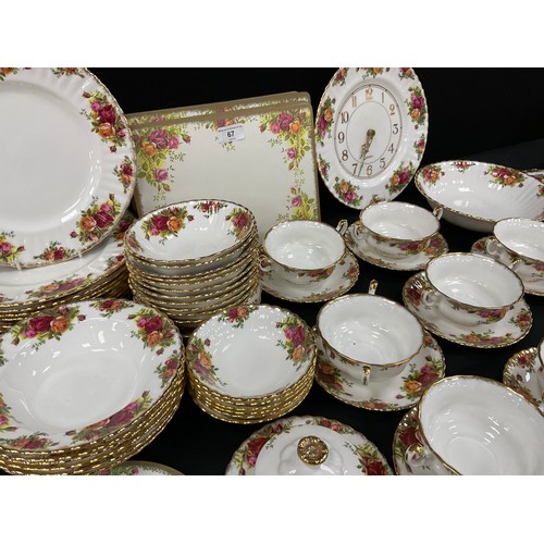 67 - Royal Albert ‘Old Country roses’ table service for eight including; a eight dinner plates, three med... 