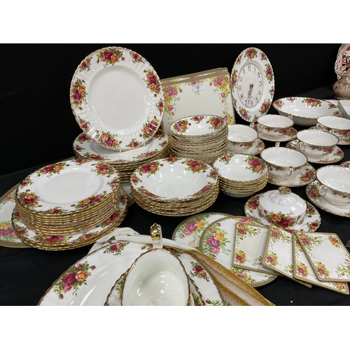 67 - Royal Albert ‘Old Country roses’ table service for eight including; a eight dinner plates, three med... 