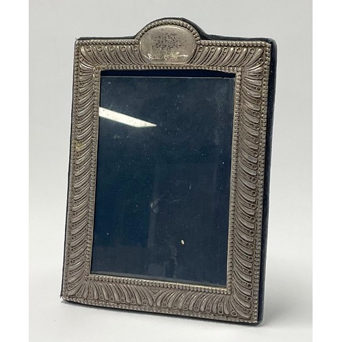 120 - An Elizabeth II silver easel photograph frame, Sheffield 1994