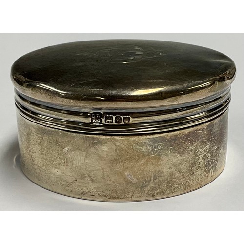 520 - A Victorian silver circular tobacco box and cover, of plain design, the cover monogrammed, 8cm diame... 