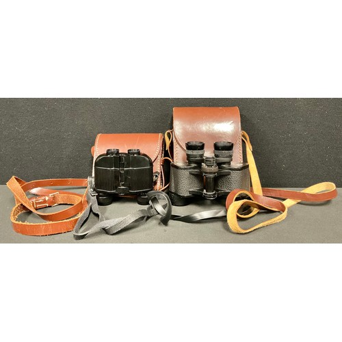 530 - A pair of Carl Zeiss Jena Sportur binoculars, 6 X 24, serial number 1736346, brown leather case; a p... 