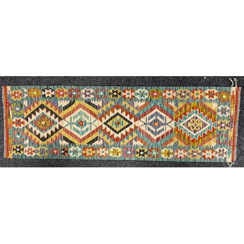 538 - Oriental Rugs and Carpets - a Chobi Kilim runner, 198cm x 62cm