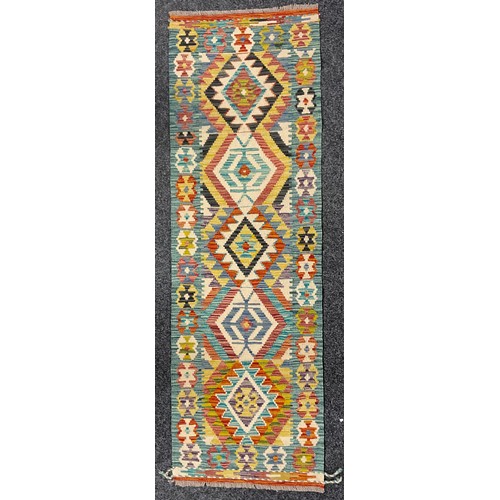 538 - Oriental Rugs and Carpets - a Chobi Kilim runner, 198cm x 62cm