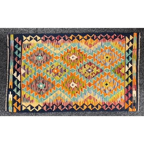 545 - Oriental Rugs and Carpets - a Chobi Kilim, 132cm xx 180cm